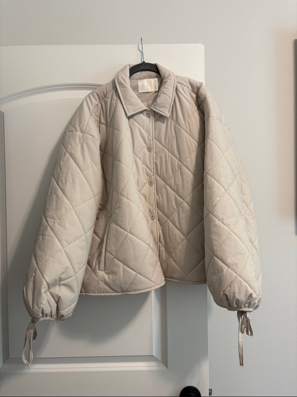 Button-Front Quilted Puffer Jacket in Soft Cream